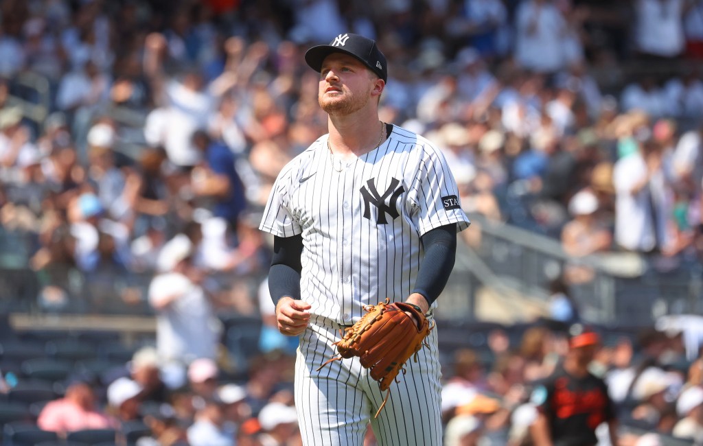 Clarke Schmidt #36 of the New York Yankees reacts as he walks back to the dugout after ending the 7th inning when the New York Yankees played the Baltimore Orioles Saturday, June 21, 2025 at Yankee Stadium in the Bronx, NY.