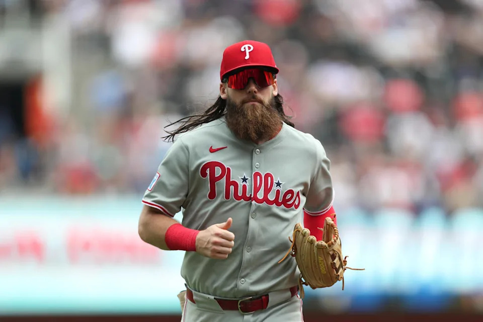 Philadelphia Phillies center fielder Brandon Marsh (16) runs to the dugout during a game against the Atlanta Braves during the fourth inning at Truist Park.