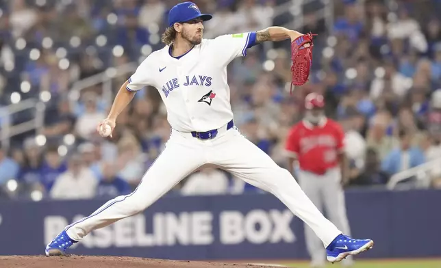 Toronto Blue Jays pitcher Kevin Gausman works against the Los Angeles Angels during first-inning baseball game action in Toronto, Sunday, July 6, 2025. (Chris Young/The Canadian Press via AP)