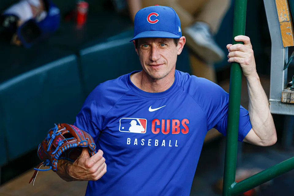 Chicago Cubs manager Craig Counsell (11) stands in the dugout before a baseball game against the Cleveland Guardians at Wrigley Field.Kamil Krzaczynski-Imagn Images