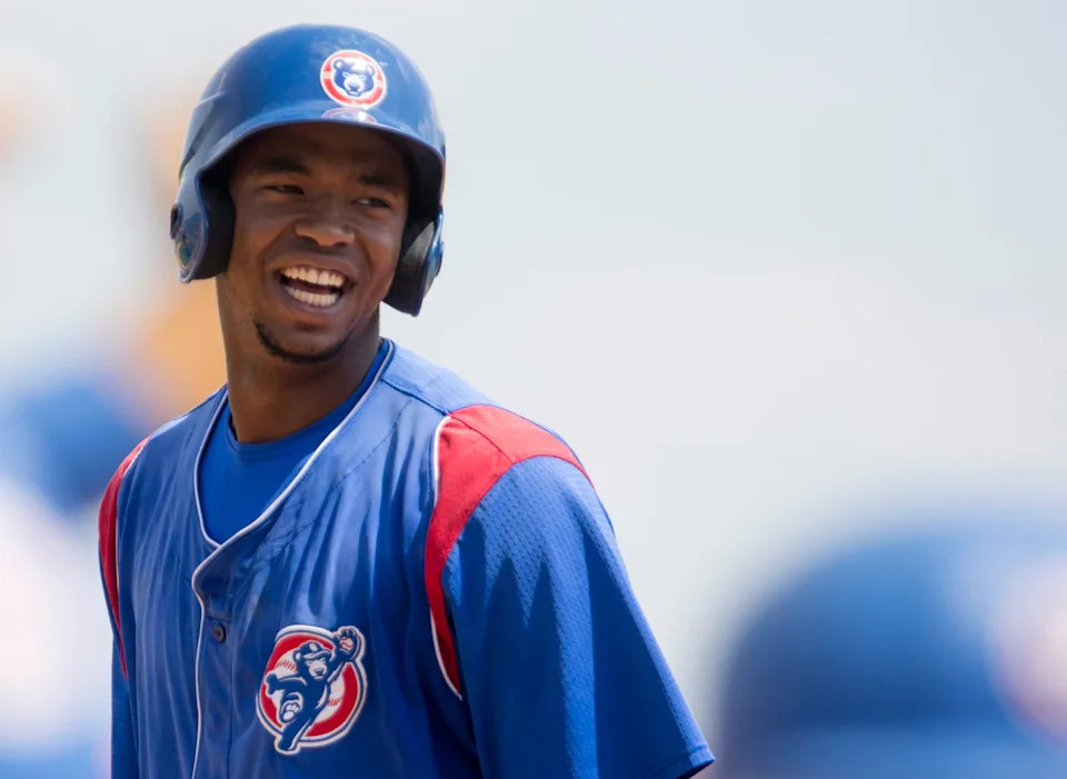 South Bend designated hitter Eloy Jimenez smiles as he takes first after bing hit by a pitch while at bat during the Cubs daytime game against the Great Lakes Loons, Wednesday, May 25, 2016 at Four Winds Field in South Bend. The Cubs beat the Great Lakes Loons 10-5. Tribune Photo/BECKY MALKEWITZ