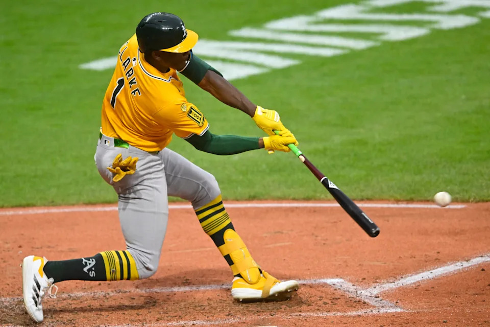 Jul 19, 2025; Cleveland, Ohio, USA; Athletics center fielder Denzel Clarke (1) doubles in the fifth inning against the Cleveland Guardians at Progressive Field. Mandatory Credit: David Richard-Imagn Images