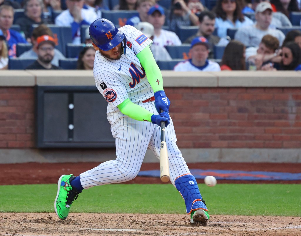 New York Mets player Francisco Alvarez at bat.