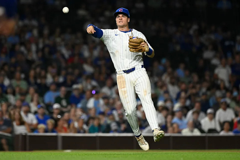 Chicago Cubs third baseman Matt Shaw (6) throws out St. Louis Cardinals catcher Yohel Pozo (63) during the ninth inning at Wrigley Field.
