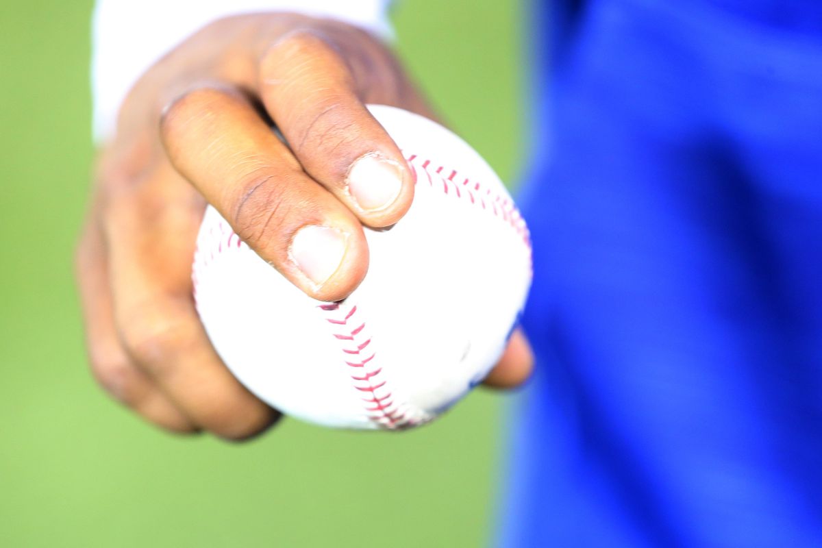 Marcus Stroman’s Holding Baseball