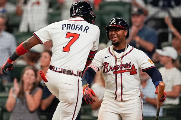 Atlanta Braves Jurickson Profar (7) celebrates his solo home run against the Los Angeles Angels in the seventh inning of a baseball game, Wednesday, July 2, 2025, in Atlanta. (AP Photo/Mike Stewart)