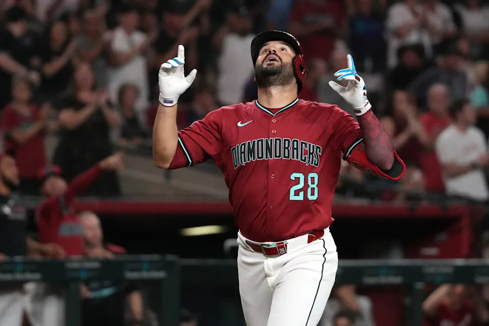 Arizona Diamondbacks third base Eugenio Suarez celebrates after hitting a home run against the Houston Astros in the third inning at Chase Field.