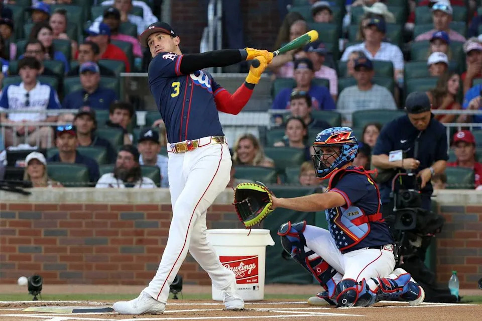 Brent Rooker (25) takes a swing during the 2025 Home Run Derby at Truist Park on Monday. He opened with three home runs in a row and added 14 more before being eliminated.