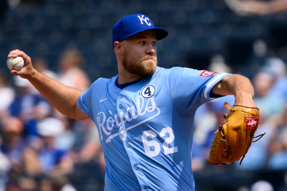 Kansas City Royals relief pitcher Jonathan Bowlan throws to a Detroit Tigers batter during the...