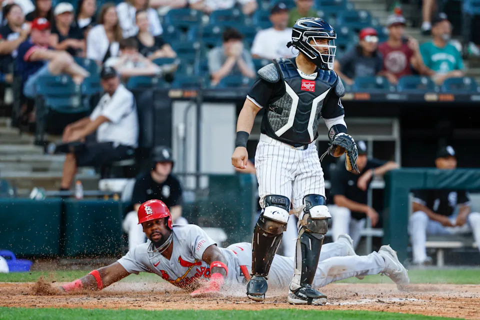 St. Louis Cardinals right fielder Jordan Walker slides into home plate in extra innings of game two of a doubleheader against the Chicago White Sox on June 19.Kamil Krzaczynski-Imagn Images