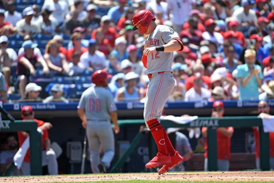 Reds outfielder Austin Hays (12) steps on home plate after hitting a solo home run during the fifth inning against the Philadelphia Phillies at Citizens Bank Park. Eric Hartline-Imagn Images