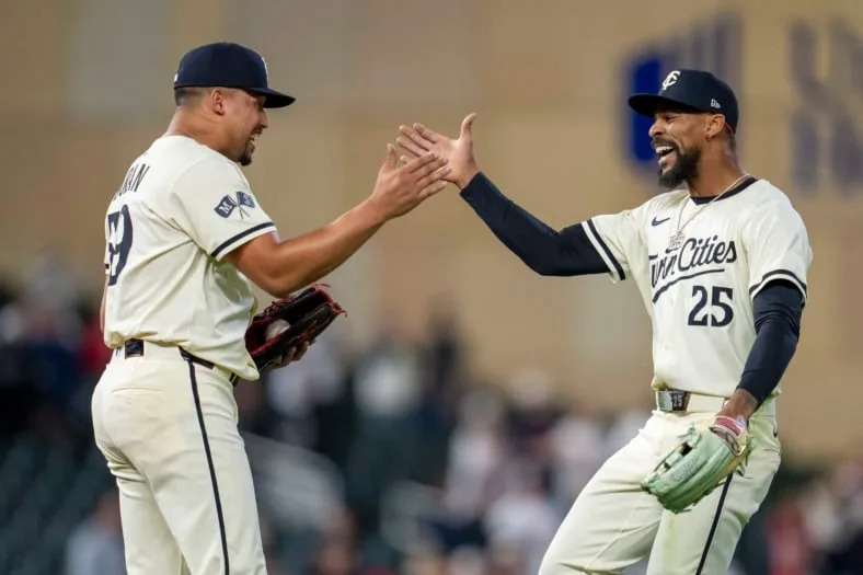 Minnesota Twins players Byron Buxton and Jhoan Duran