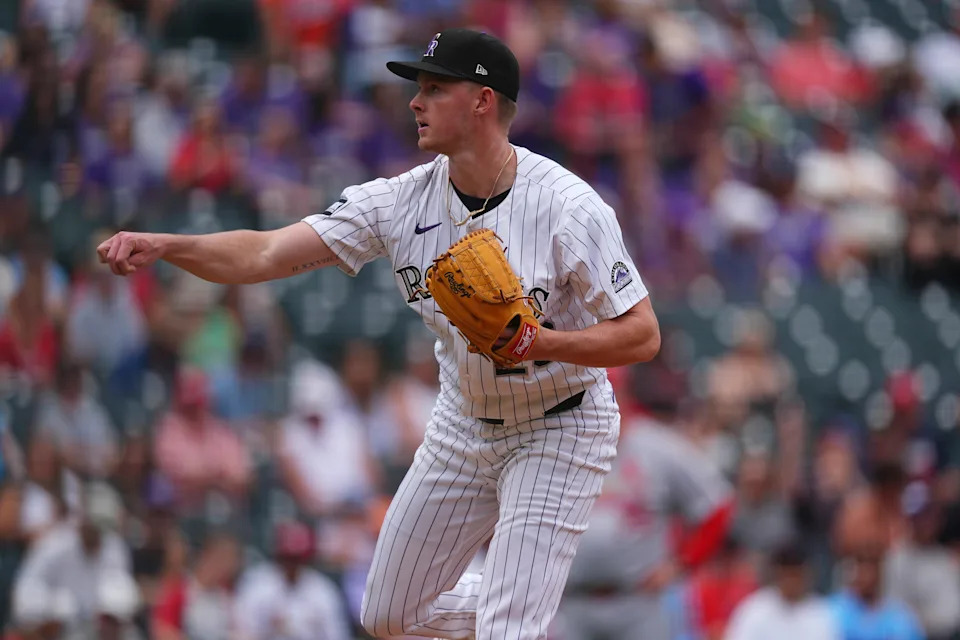 Colorado Rockies starting pitcher Tanner Gordon works against the St. Louis Cardinals in the first inning of a baseball game Wednesday, July 23, 2025, in Denver. (AP Photo/David Zalubowski)