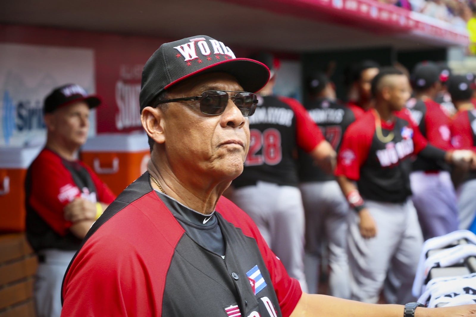World team manager Tony Perez watches from the dugout during the All-Star Futures Game held at Great American Ballpark, Sunday, July 12, 2015. GREG LYNCH / STAFF