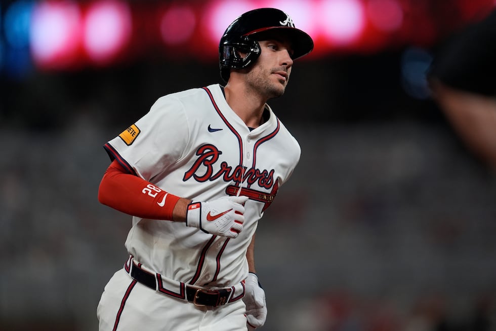 Atlanta Braves first base Matt Olson (28) rounds the bases after hitting a solo homer in the...