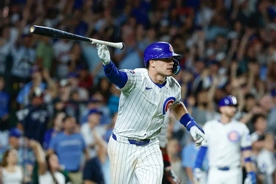Chicago Cubs third baseman Matt Shaw (6) hits a walk-off sacrifice fly against the Cleveland Guardians during the tenth inning at Wrigley Field.Kamil Krzaczynski-Imagn Images