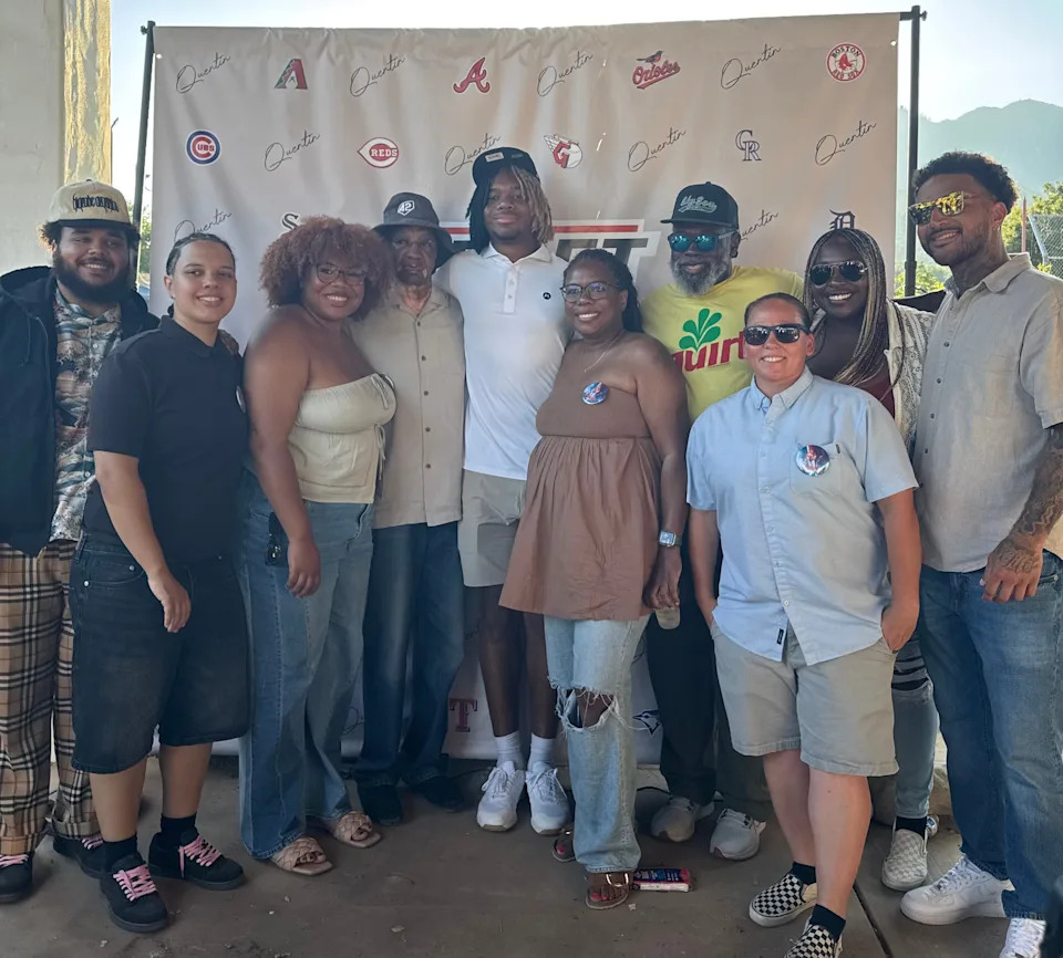 Former Oaks Christian star Quentin Young (center) poses with family and friends after being selected by the Minnesota Twins during the Major League Baseball Draft on July 13.