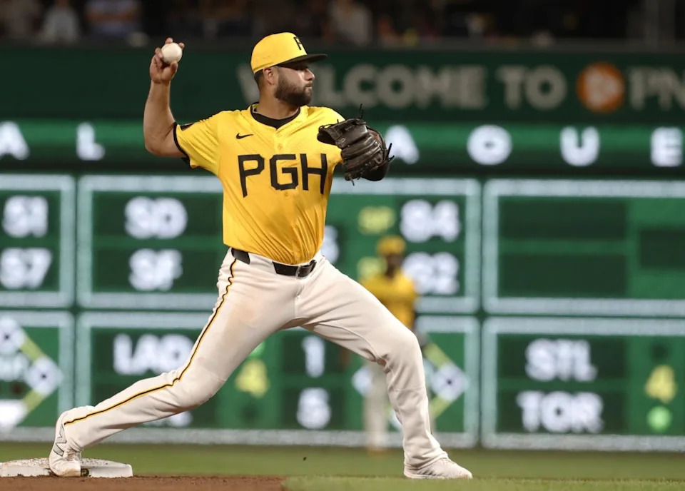 Pittsburgh Pirates shortstop Isiah Kiner-Falefa records an out at second base and throws to throws to first against the Kansas City Royals at PNC Park on Sept. 13, 2024.Charles LeClaire-Imagn Images