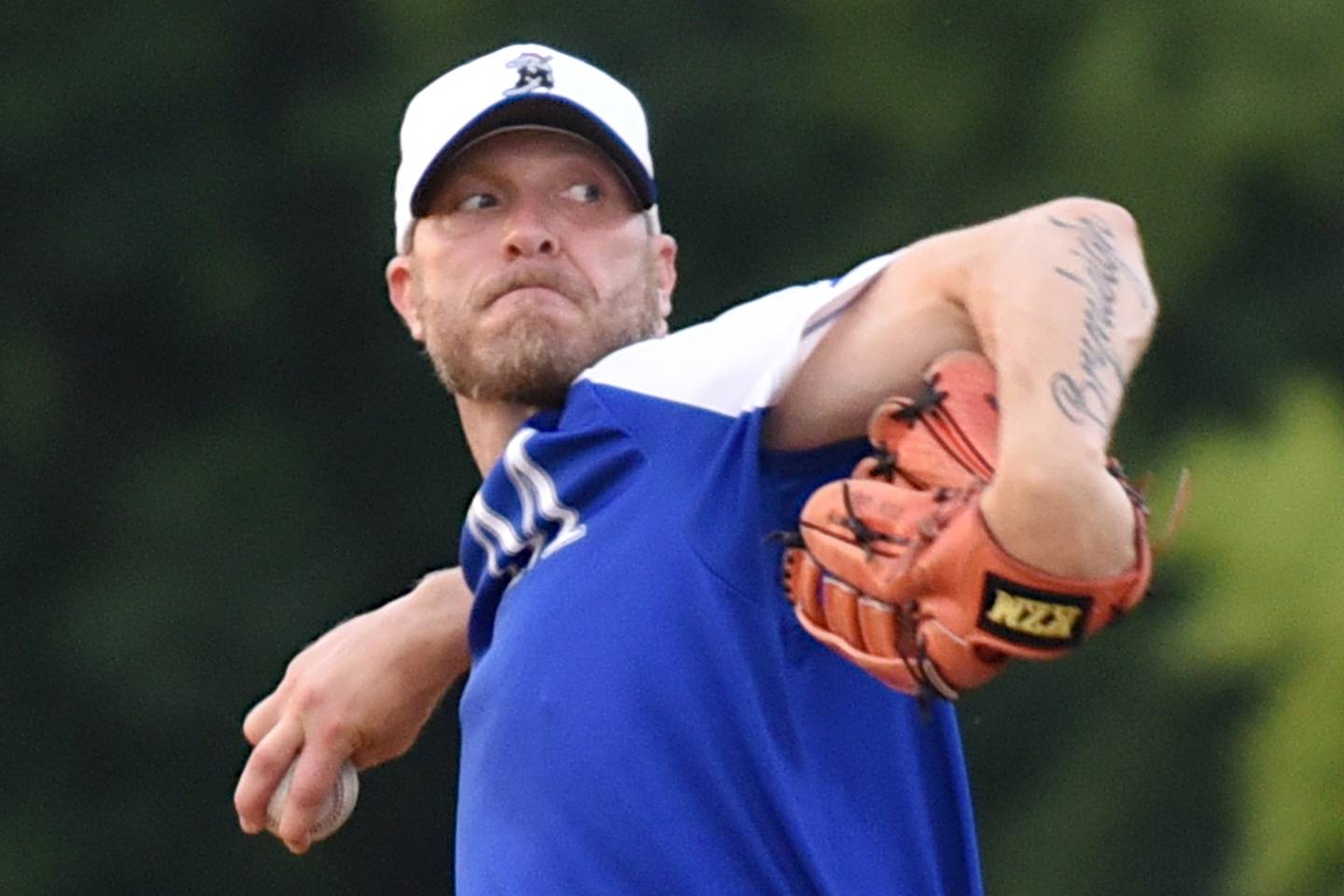 Beecher Muskies' Kris Honel throws a pitch during a Chicago Suburban Baseball League game against the Lombard Orioles at Gouwens Park in South Holland last month.