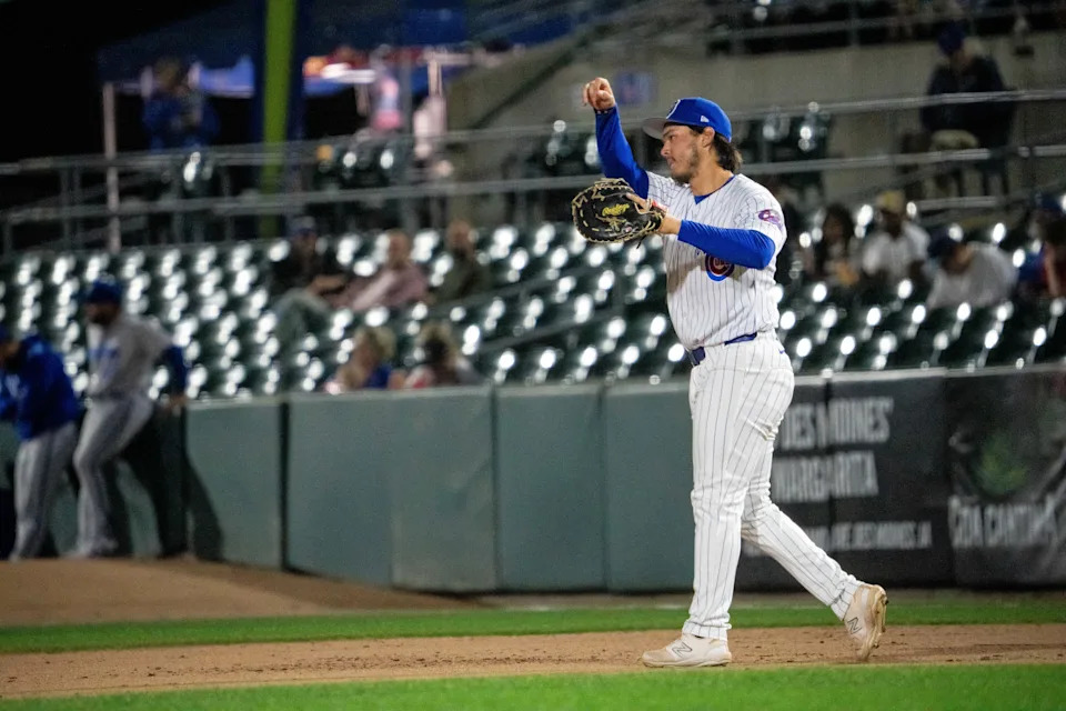 Iowa Cubs' Jonathon Long (27) throws the ball to second on Friday, March 28, 2025, at Principal Park in Des Moines.