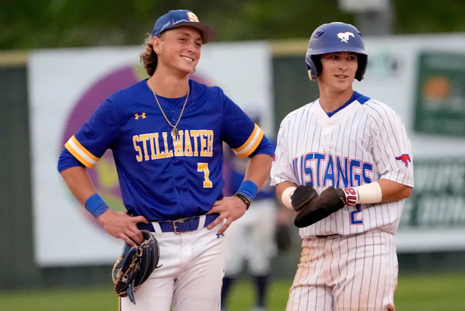 Stillwater's Ethan Holliday (left) during an April 18, 2025, game. Holliday is considered one of the top prospects in the 2025 MLB Draft and seems unlikely to fall to the Reds, who hold the No. 9 pick in the first round.