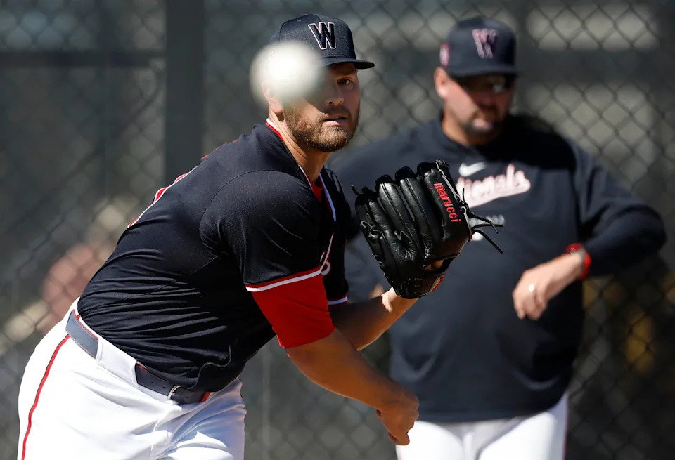 Washington Nationals pitcher Tanner Rainey throws during spring training workouts on Feb. 20, 2024.