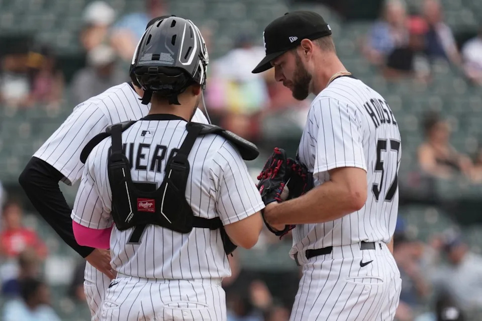 Adrian Houser puked after pitching a scoreless first inning, but remained in the game. AP
