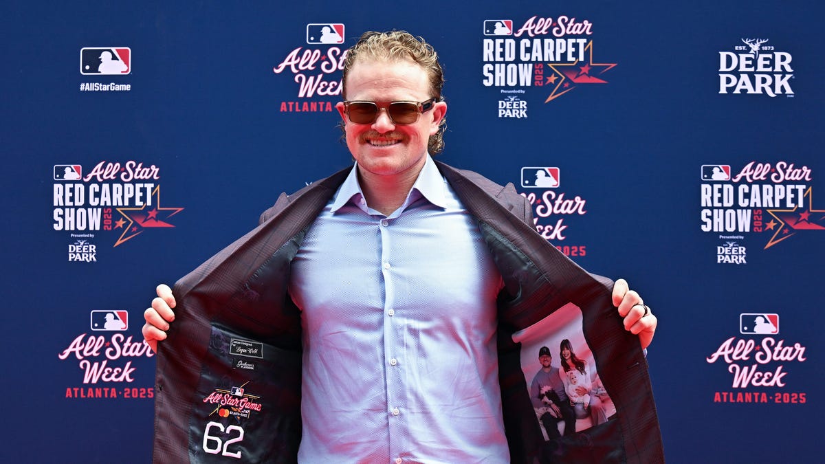 Andrew Abbott joined by WLWT news anchor on All-Star Game red carpet