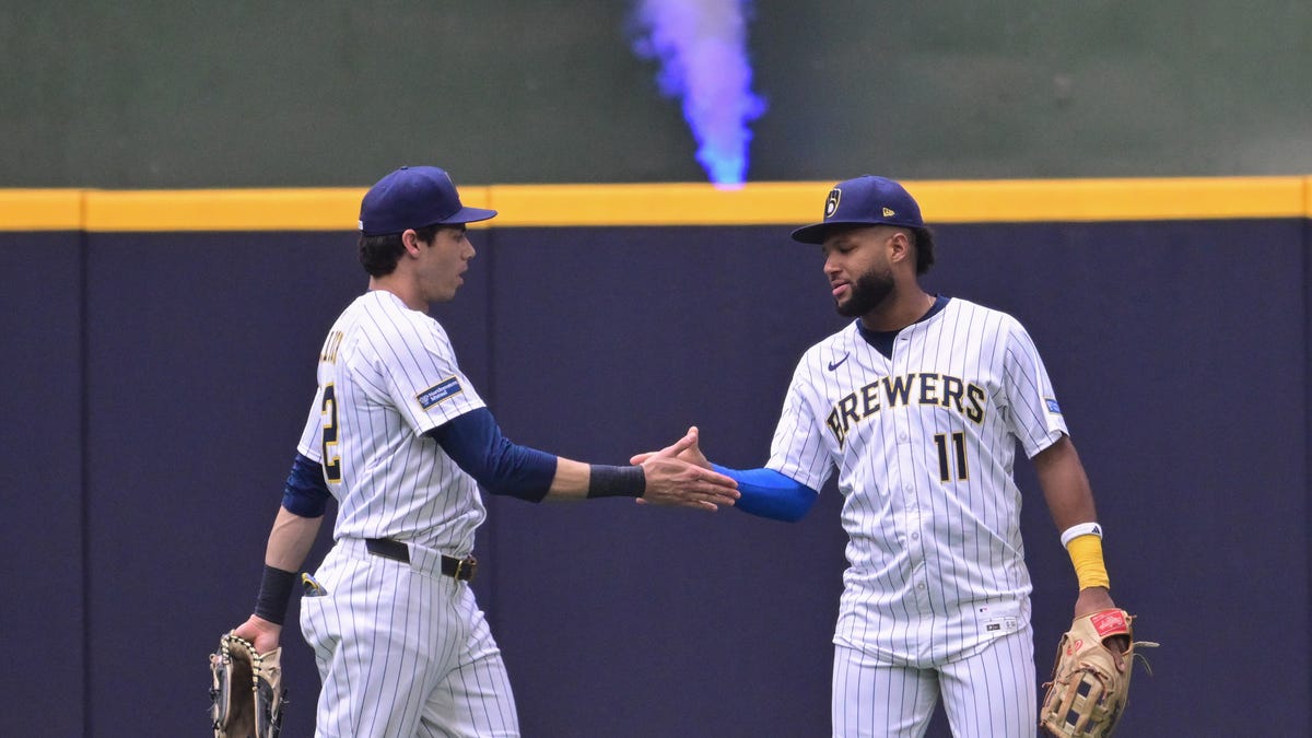 Brewers rise in NL Central standings with LA sweep