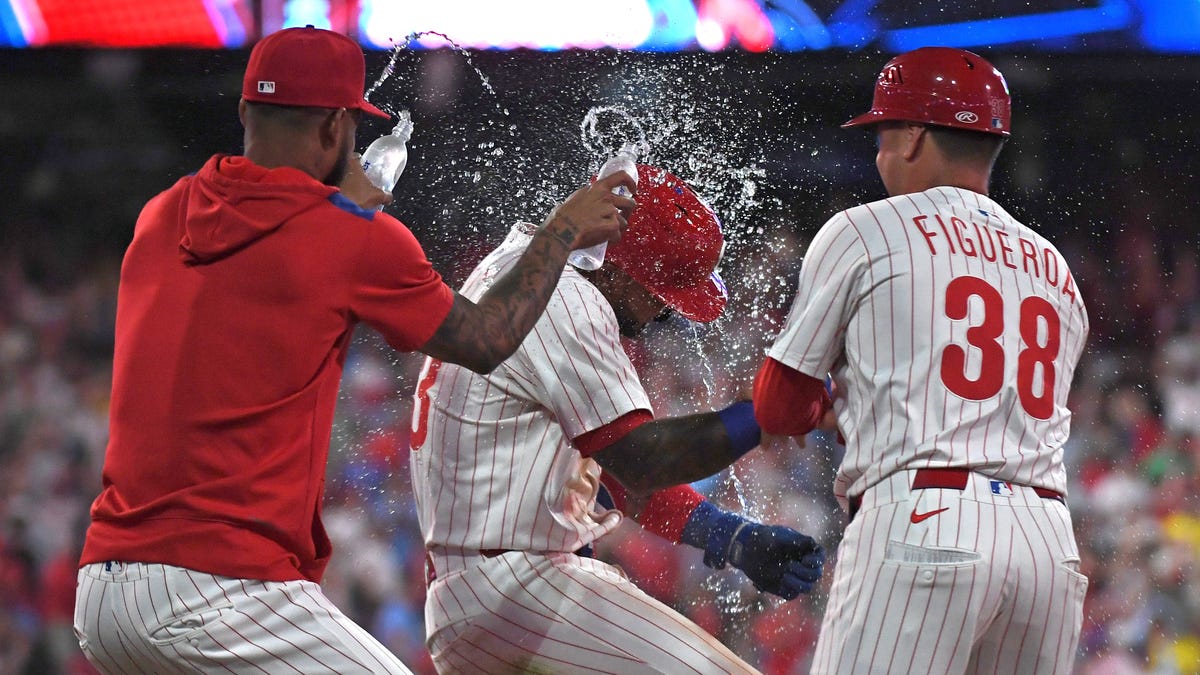Phillies top Red Sox on catcher's interference in walk-off win in 10th