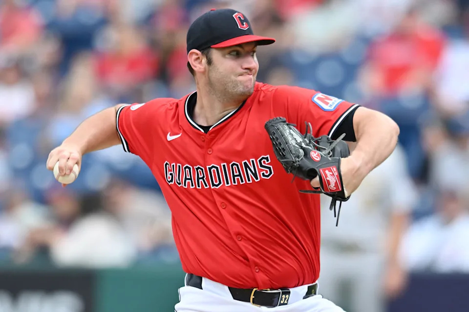 Jul 20, 2025; Cleveland, Ohio, USA; Cleveland Guardians starting pitcher Gavin Williams (32) throws a pitch during the first inning against the Athletics at Progressive Field. Mandatory Credit: Ken Blaze-Imagn Images