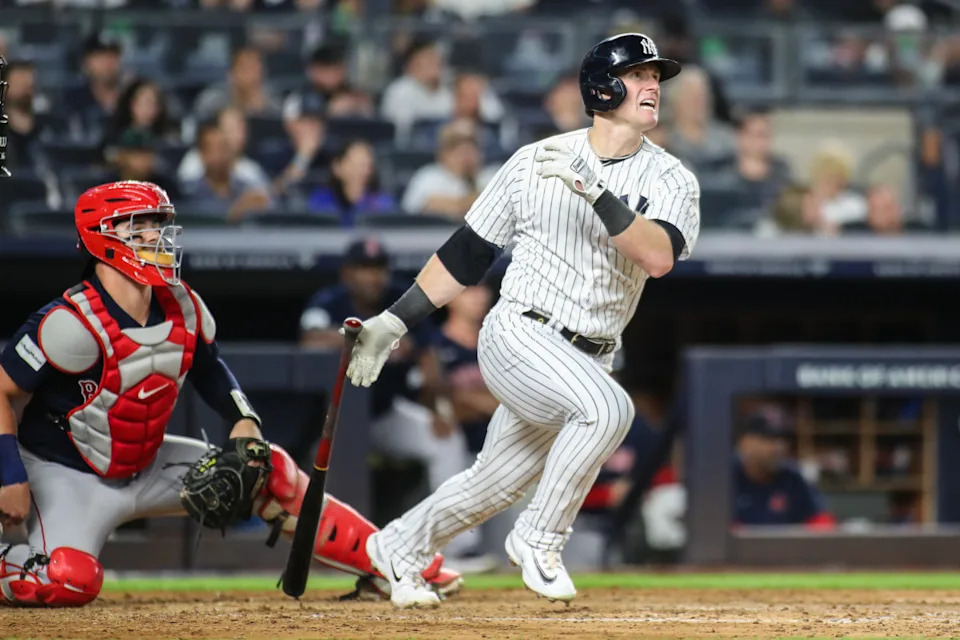 New York Yankees left fielder Billy McKinney (57) hits a single in the fourth inning against the Boston Red Sox at Yankee Stadium.Wendell Cruz-Imagn Images