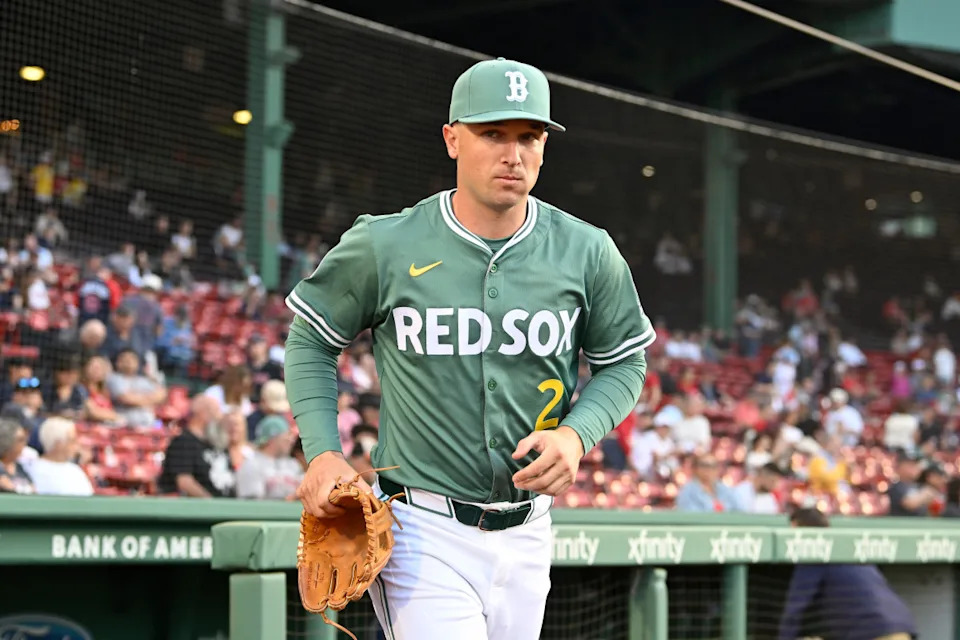 Boston Red Sox third baseman Alex Bregman (2) runs out of the dugout before the start of a game against the Atlanta Braves at Fenway Park.Eric Canha-Imagn Images