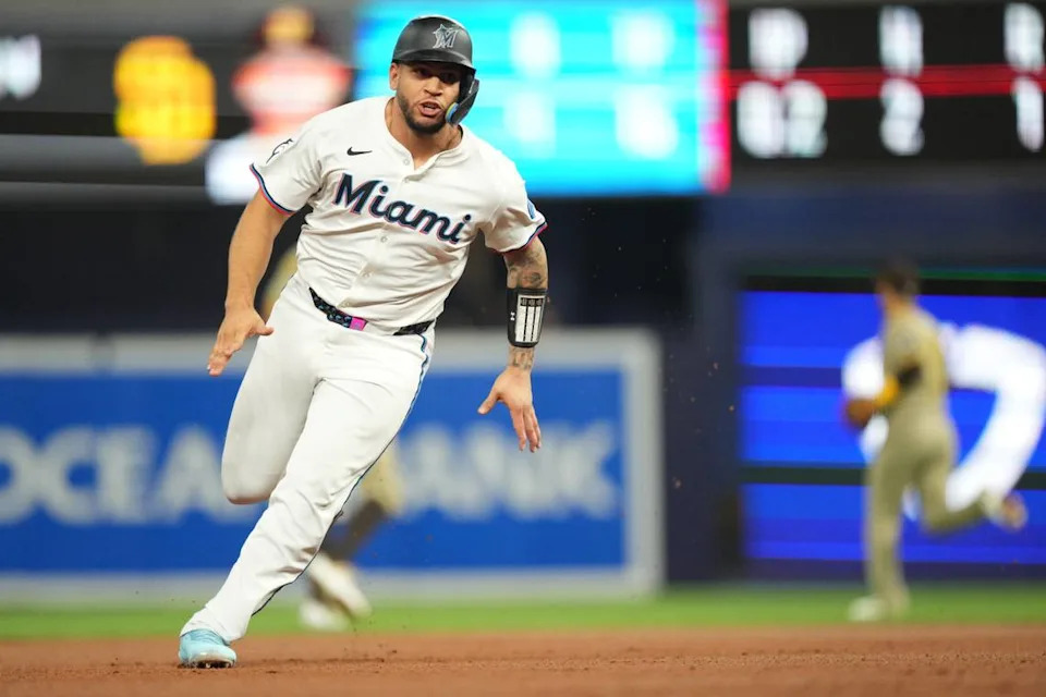 Jul 22, 2025; Miami, Florida, USA; Miami Marlins catcher Agustín Ramírez (50) rounds third and scores a run in the first inning against the San Diego Padres at loanDepot Park. Mandatory Credit: Jim Rassol-Imagn Images