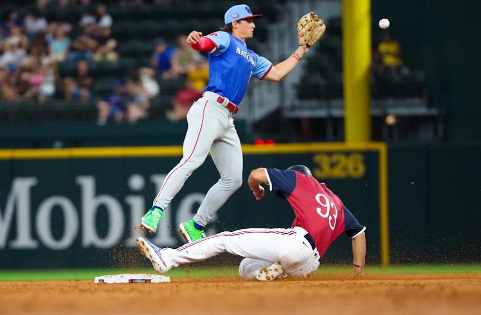 Jul 13, 2024; Arlington, TX, USA; American League Future outfielder Spencer Jones (93) steals second base ahead of the tag by National League Future infielder Aidan Miller (10) during the fourth inning during the Major league All-Star Futures game at Globe Life Field.Kevin Jairaj-USA TODAY Sports