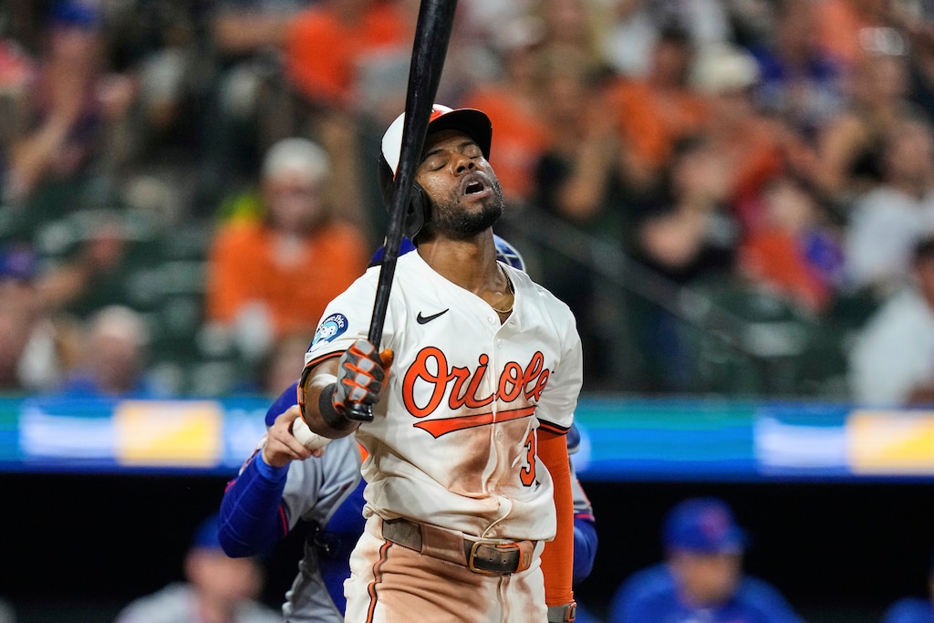 Baltimore Orioles' Cedric Mullins reacts after striking out swinging during the ninth inning of a baseball game against the New York Mets, Tuesday, July 8, 2025, in Baltimore. (AP Photo/Stephanie Scarbrough)