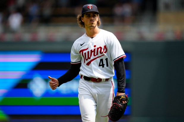Minnesota Twins starting pitcher Joe Ryan (41) celebrates after pitching a complete-game shutout to defeat the Boston Red Sox 6-0 in a baseball game Thursday, June 22, 2023, in Minneapolis. (AP Photo/Abbie Parr)