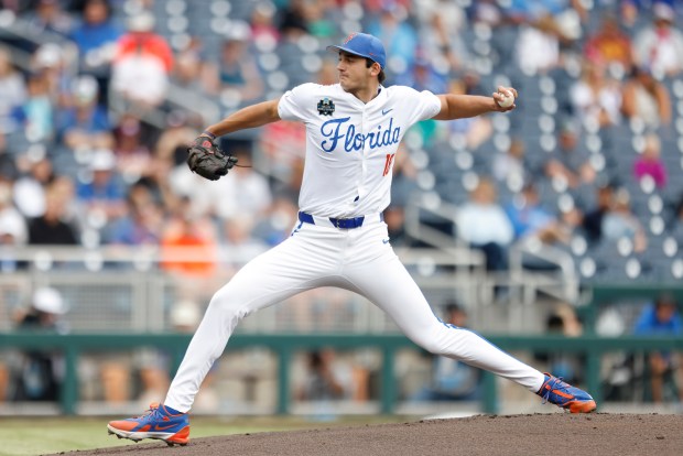 Florida pitcher Pierce Coppola (18)  throws in the top of the first inning during an NCAA College World Series baseball elimination game against Kentucky on Wednesday, June 19, 2024, in Omaha, Neb. (AP Photo/Mike Buscher)