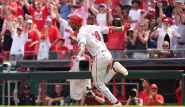 Cincinnati Reds' Spencer Steer (7) celebrates with teammates after hitting a two-run home run during the fifth inning of a baseball game against the San Diego Padres, Friday, June 27, 2025, in Cincinnati.