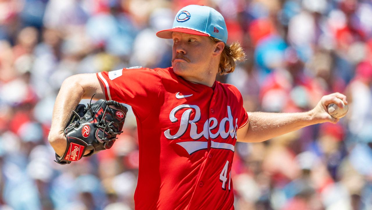 Cincinnati Reds starting pitcher Andrew Abbott throws in the first inning of a baseball game against the Philadelphia Phillies, Friday, July 4, 2025, in Philadelphia. (AP Photo/Laurence Kesterson)