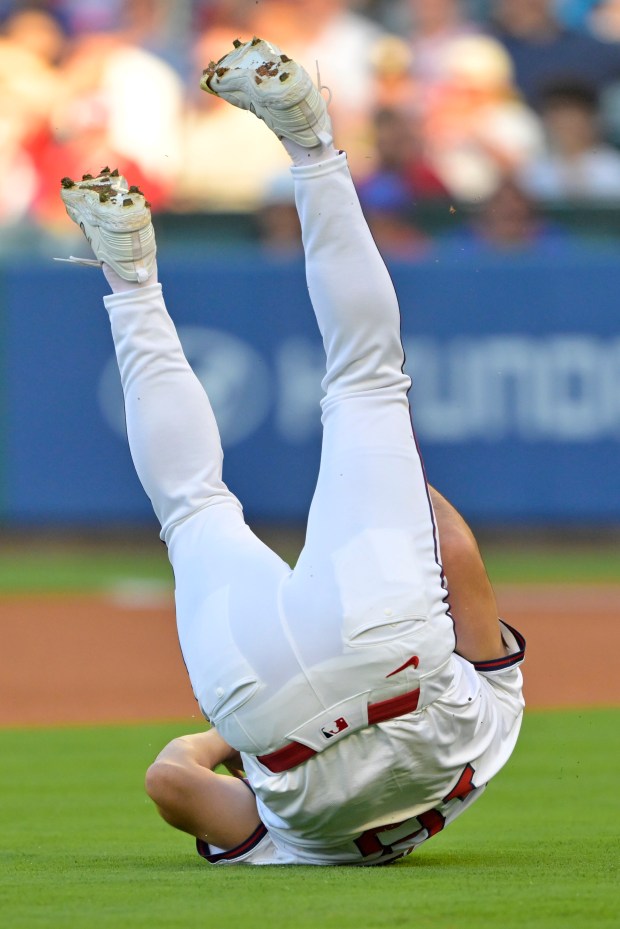 Angels starting pitcher Yusei Kikuchi loses his glove and flips...