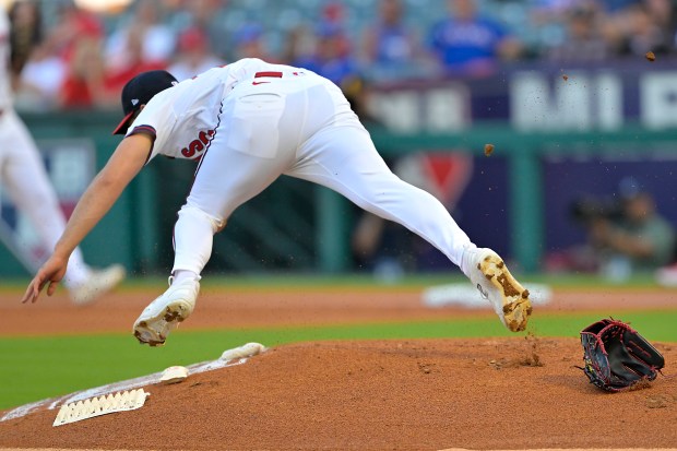 Angels starting pitcher Yusei Kikuchi loses his glove and flips...
