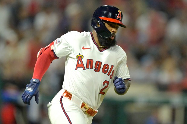 The Angels’ Luis Rengifo runs the bases after hitting a...