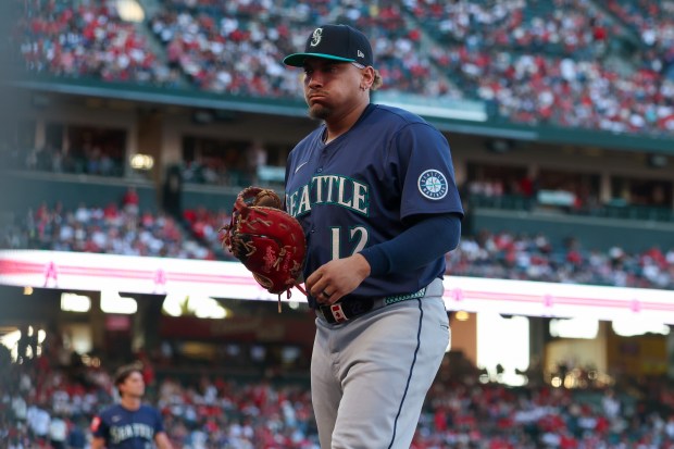 Newly acquired Seattle Mariners first baseman Josh Naylor walks off...