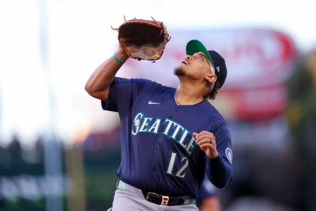 Newly acquired Seattle Mariners first baseman Josh Naylor fields a...