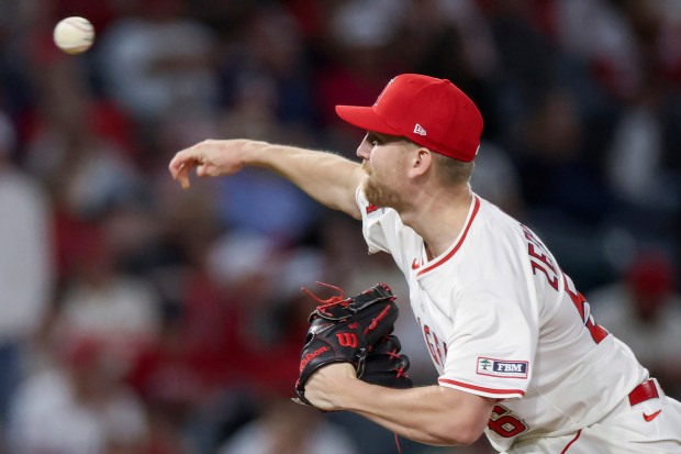 Angels relief pitcher Ryan Zeferjahn throws to the plate during...