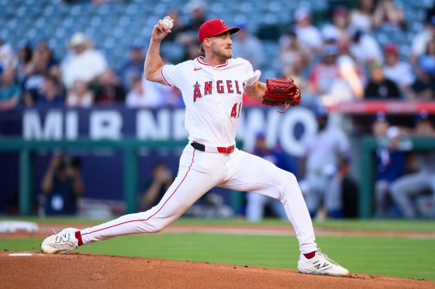 Angels starting pitcher Jack Kochanowicz throws to the plate during...