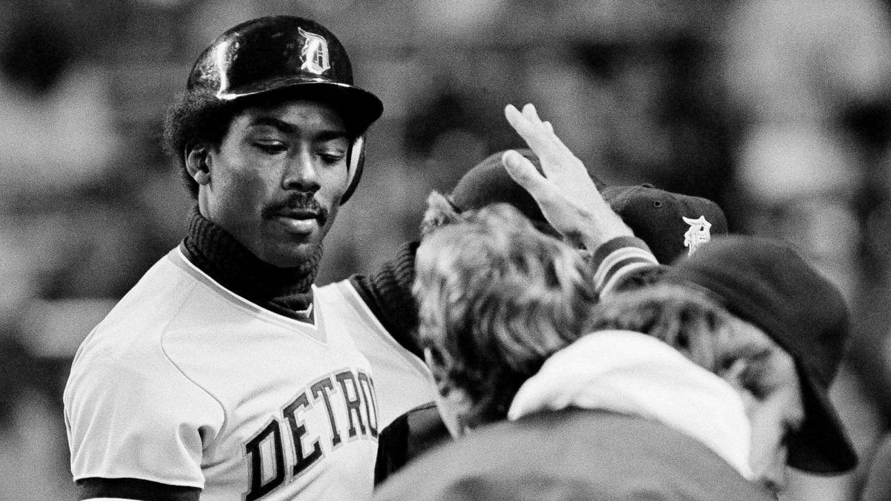 Detroit Tigers right fielder Chet Lemon takes a low five from teammates as he returns to the dugout on Thursday, April 22, 1982 in New York. (AP Photo/Ray Stubblebine)