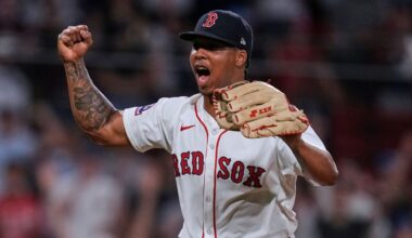 Boston Red Sox pitcher Brayan Bello celebrates after getting the win, throwing a complete game against the Colorado Rockies after a baseball game at Fenway Park, Tuesday, July 8, 2025, in Boston. (AP Photo/Charles Krupa)