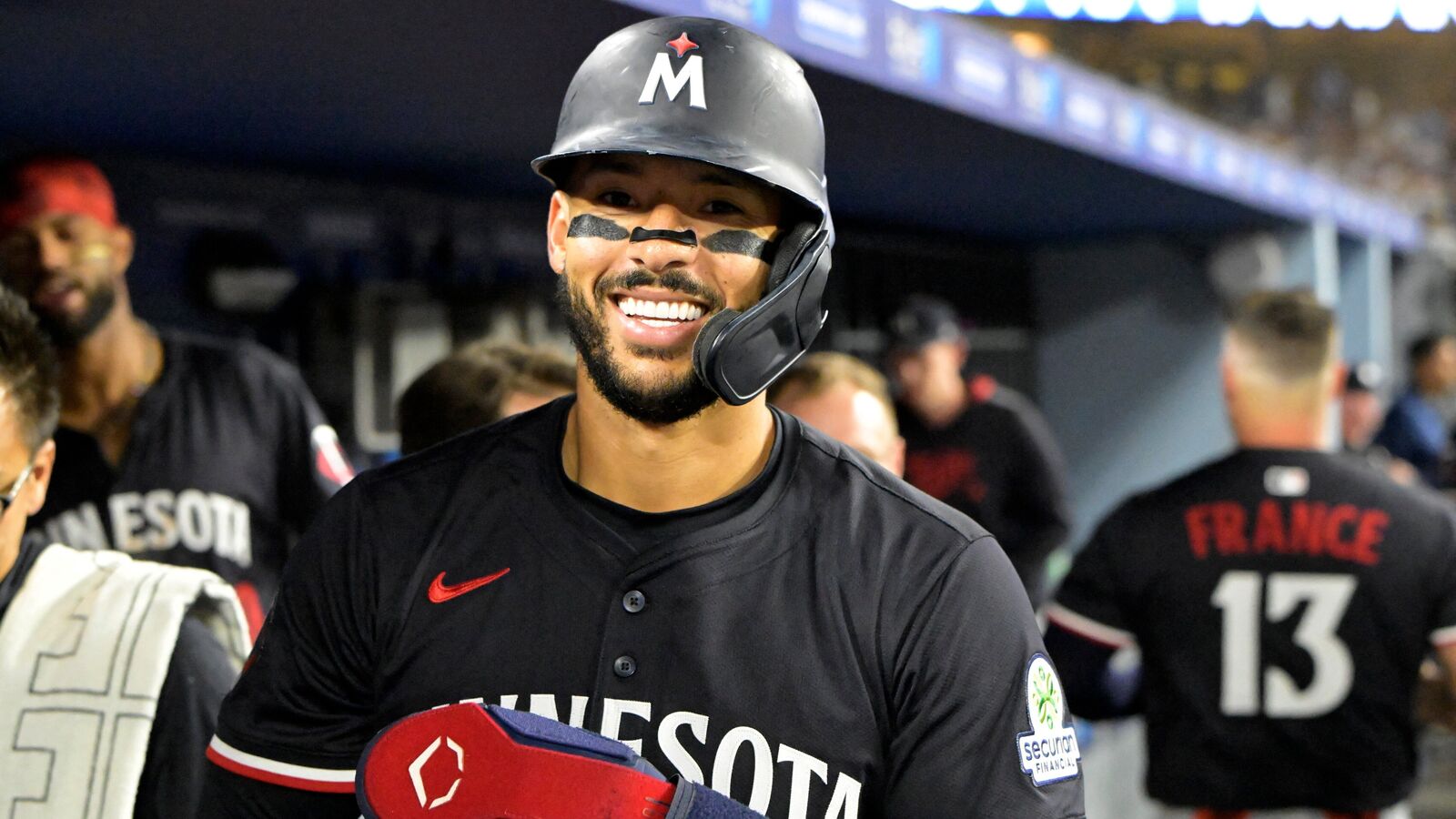 Minnesota Twins shortstop Carlos Correa (4) in the dugout after scoring a run against the Los Angeles Dodgers at Dodger Stadium. (file photo)